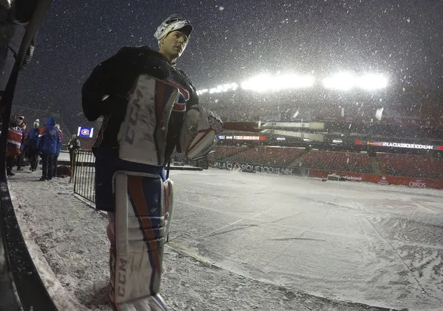 Montreal Canadiens goalie Carey Price leaves the ice following an outdoor practice Friday December 15, 2017, in Ottawa, Ontario. The Senators will play the Montreal Canadiens in the NHL 100 Classic regular season match outdoors on Saturday. (Photo by Adrian Wyld/The Canadian Press via AP Photo)