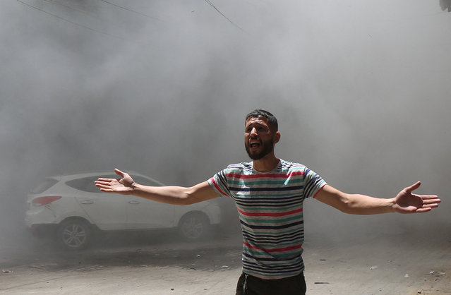 A Palestinian reacts at the site of an Israeli strike on a house, in Gaza City, on June 1, 2025. (Photo by Mahmoud Issa/Reuters)