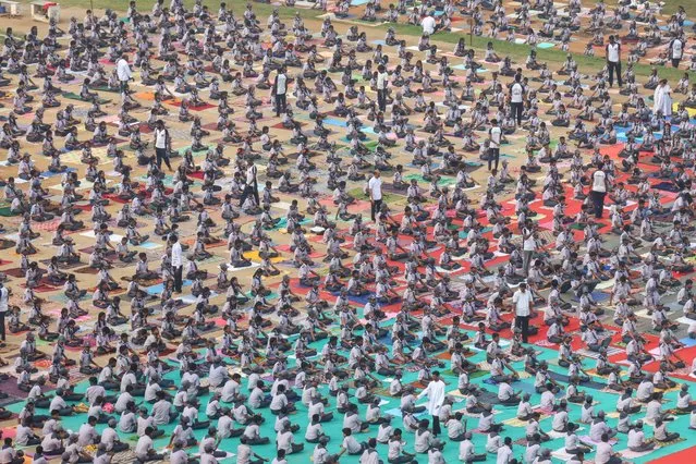Over 5000 School students take part in a yoga training session at the Rajaratnam Stadium in Chennai on January 8, 2023. Yoga is a group of physical, mental, and spiritual practices or disciplines which originated in ancient India. There is a wide variety of schools of yoga, practices, and goals. Traditional and modern yoga is practiced worldwide. (Photo by Seshadri Sukumar/ZUMA Press Wire/Rex Features/Shutterstock)