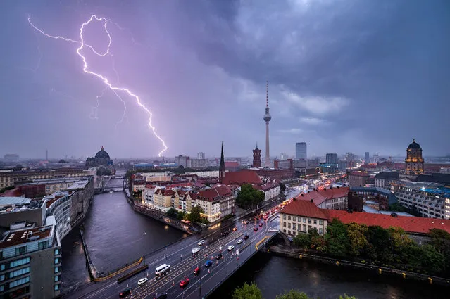 Thunderstorm over the skyline of Berlin, with the Berlin Cathedral and the TV Tower on August 15, 2022. (Photo by David Heerde/Rex Features/Shutterstock)