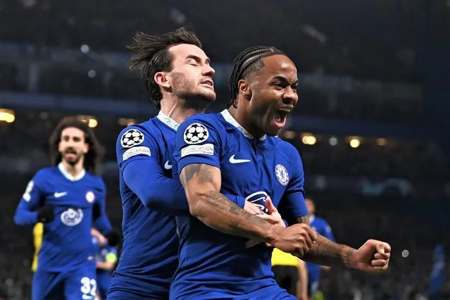 Raheem Sterling of Chelsea celebrates after scoring the team's first goal with teammate Ben Chilwell during the UEFA Champions League round of 16 leg two match between Chelsea FC and Borussia Dortmund at Stamford Bridge on March 07, 2023 in London, England. (Photo by Darren Walsh/Chelsea FC via Getty Images)