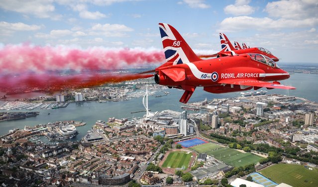 The British Royal Air Force's (RAF) aerobatic team, the “Red Arrows” perform a flypast the UK's national commemorative event to mark the 80th anniversary commemorations of Allied amphibious landing (D-Day Landings) in France in 1944, in Southsea Common, southern England, on June 5, 2024. Heads of state and veterans are due to mark the anniversary of D-Day on June 6, a date that was key to Allied Europe's eventual victory against the Nazis in World War II. (Photo by Cpl Phil Dye/UK MOD via Reuters)