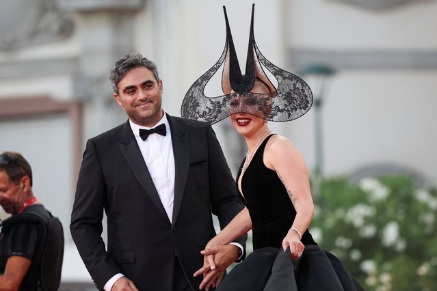 American singer-songwriter and actress Lady Gaga and her fiancé Michael Polansky pose on the red carpet during arrivals for the screening of the movie “Joker: Folie a Deux”, in competition, at the 81st Venice Film Festival, Venice, Italy, on September 4, 2024. (Photo by Louisa Gouliamaki/Reuters)