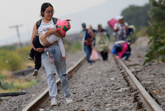 Pilgrims from various Mexican states walk along train tracks in Chimalhuacan, State of Mexico, to reach the Basilica of Our Lady of Guadalupe in Mexico City and celebrate the Day of Our Lady of Guadalupe, held every December 12th to give thanks for miracles and favors received, in Chimalhuacan, State of Mexico, on December 11, 2025. (Photo by Gerardo Vieyra/NurPhoto/Rex Features/Shutterstock)
