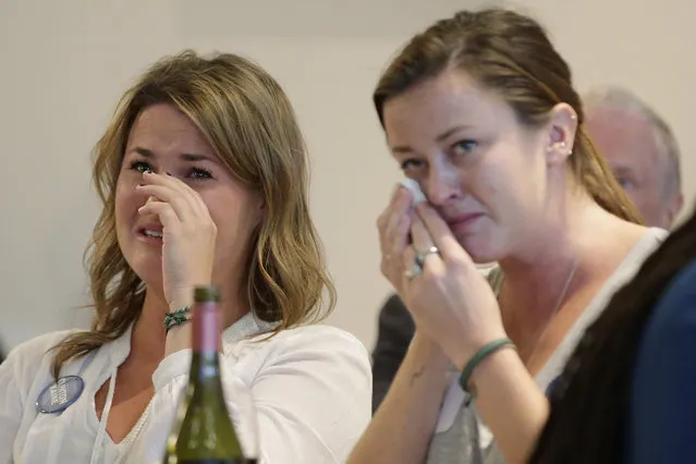 Democrat voters react to the election result at a “Democrats Abroad” event on November 9, 2016 in Melbourne, Australia. Americans have gone to the polls today, November 8 in the U.S., to elect the 45th President of the United States. Hillary Clinton represents the Democrats and, if successful, would be the first woman president in American history. Donald Trump represents the Republicans and his campaign has been dogged by bad publicity, despite this the polls show that either of the two contenders could win with the election too close to call. There has been huge interest in the United States Election in Australia, with many people arranging viewing parties around the country to watch the results live. (Photo by Darrian Traynor/Getty Images)