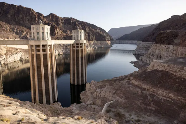 A growing amount of exposed rock is seen near intake tubes at Hoover Dam, where water levels have declined dramatically to lows not seen since the Lake Mead reservoir was filled after its construction, as climate change and growing demand for its water shrink the Colorado River and create challenges, in Boulder City, Nevada, U.S., April 17, 2022. (Photo by Caitlin Ochs/Reuters)