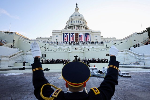 A conductor attends a rehearsal in front of the U.S. Capitol ahead of the presidential inauguration of U.S. President-elect Donald Trump, in Washington, U.S., January 12, 2025. (Photo by Fabrizio Bensch/Reuters)
