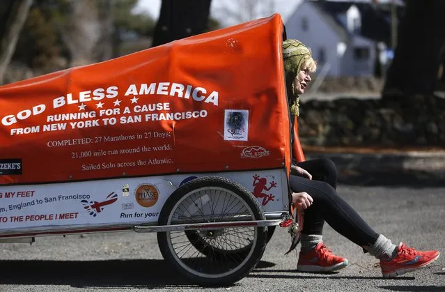 Sixty-eight year old cross-country runner Rosie Swale-Pope is interviewed while sitting in her cart, “The Icebird”, in Upperville, Virginia March 13, 2015. Swale-Pope, who is from Great Britain and once ran an unsupported 20,000 mile run around the globe,  is currently running across the United States from New York City to San Francisco in support of cancer research. (Photo by Gary Cameron/Reuters)