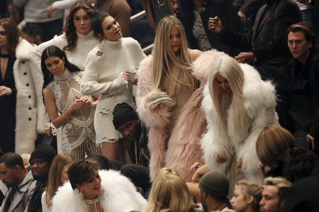 (L-R) Caitlyn Jenner, Kourtney Kardashian, Kendall Jenner, Lamar Odom, Khloe Kardashian and Kim Kardshian attend Kanye West's Yeezy Season 3 Collection presentation and listening party for the “The Life of Pablo” album during New York Fashion Week February 11, 2016. Also pictured are Jonathan Cheban (top R) and Kris Jenner (seated, front C). (Photo by Andrew Kelly/Reuters)