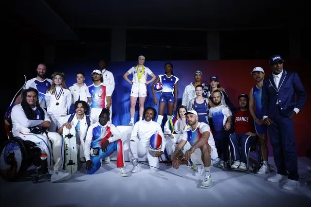 Athletes present French team outfits for the Paris 2024 Olympic and Paralympic Games by designer Stephane Ashpool for Le Coq Sportif sportswear brand during the outfits' presentation in Paris on January 16, 2024. The Paris Olympics 2024 are set to take place from July 26 to August 11. (Photo by Sarah Meyssonnier/Reuters)