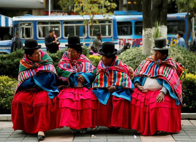 Women who support Qhara Qhara community, a Quechua ethnic group, rest during a protest in La Paz, Bolivia, March 18, 2019. (Photo by David Mercado/Reuters)
