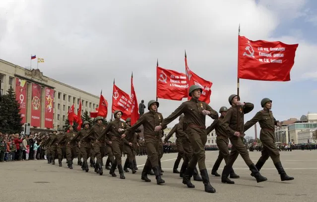Participants dressed in historical uniform take part in the celebrations for the Victory Day in Stavropol, Russia, May 9, 2015. (Photo by Eduard Korniyenko/Reuters)