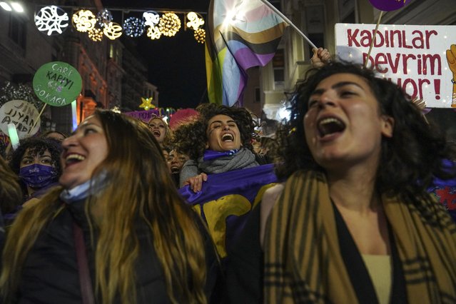 Women shout slogans during a protest marking the International Day for the Elimination of Violence against Women in Istanbul, Turkey, Thursday, November 25, 2021. Police on Thursday fired tear gas to break up a protest by women in Istanbul who were marching to press for Turkey's return to a landmark treaty that aims to protect women from violence. (Photo by Kemal Aslan/AP Photo)