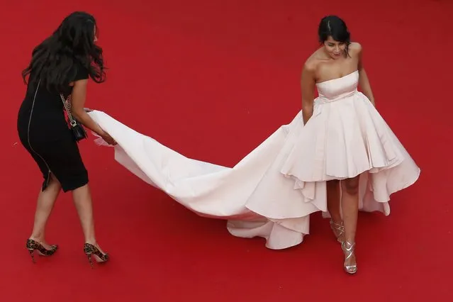 Actress Leila Bekhti poses on the red carpet as she arrives for the opening ceremony and the screening of the film “La tete haute” out of competition during the 68th Cannes Film Festival in Cannes, southern France, May 13, 2015. (Photo by Benoit Tessier/Reuters)