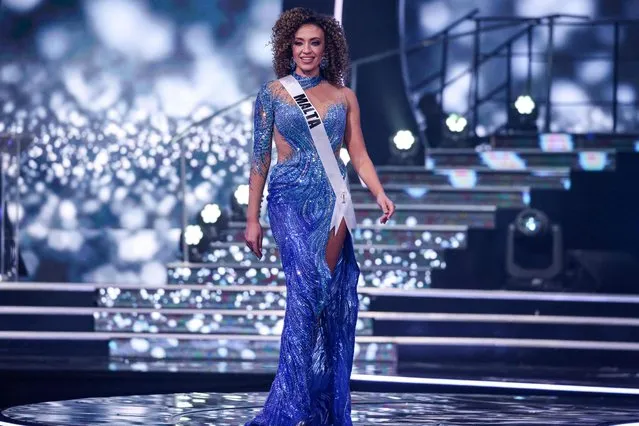 Miss Malta, Jade Cini, presents herself on stage during the preliminary stage of the 70th Miss Universe beauty pageant in Israel's southern Red Sea coastal city of Eilat on December 10, 2021. (Photo by Menahem Kahana/AFP Photo)