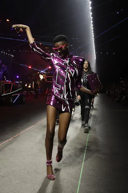 A model wears a creation as part of the Plein men's Spring-Summer 2020 collection, unveiled during the fashion week, in Milan, Italy, Saturday, June 15, 2019. (Photo by Luca Bruno/AP Photo)
