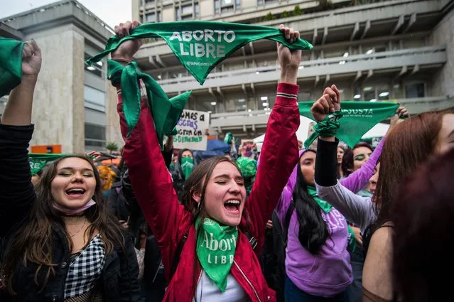 Pro-Choice feminist movements demonstrate in the outskirts of the Constitutional Court, at the Justice Palace in support of the decriminalization of abortions in Colombia, in Bogota, Colombia on February 9, 2022. The debate has summed more than 500 days without a verdict. (Photo by Sebastian Barros/NurPhoto via Getty Images)