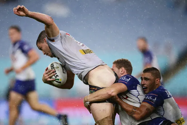 Corey Oates of the Broncos is tackled by Brenko Lee of the Bulldogs during the round five NRL match between the Canterbury Bulldogs and the Brisbane Broncos at ANZ Stadium on March 30, 2017 in Sydney, Australia. (Photo by Matt King/Getty Images)