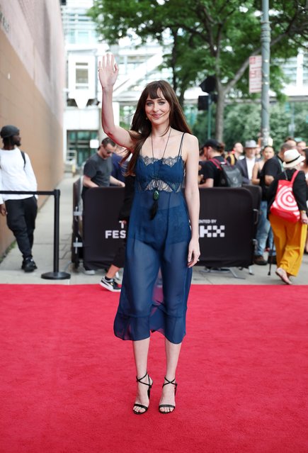 Dakota Johnson attends the “Daddio” Premiere during the 2024 Tribeca Festival at BMCC Theater on June 10, 2024 in New York City on June 10, 2024. The American actress wore a sheer blue slip dress and black heels. (Photo by The Image Direct)
