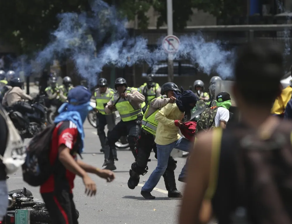 Venezuela Protesters target Maduro