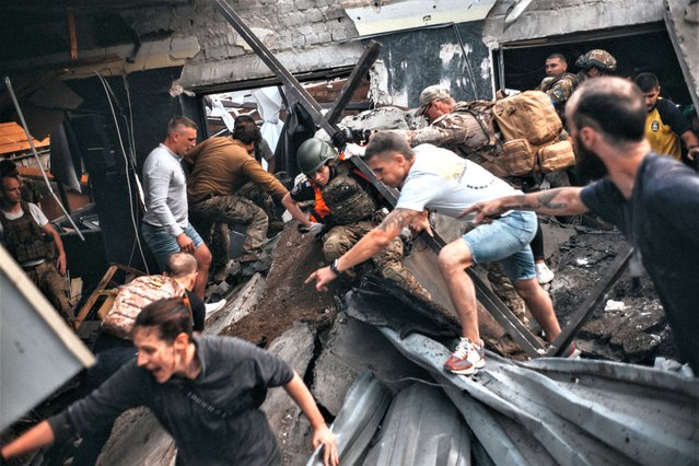 Search and rescue efforts continue after a Russian missile attack hits Ria restaurant in Kramatorsk, Ukraine on June 27, 2023. (Photo by Wojciech Grzedzinski/Anadolu Agency via Getty Images)