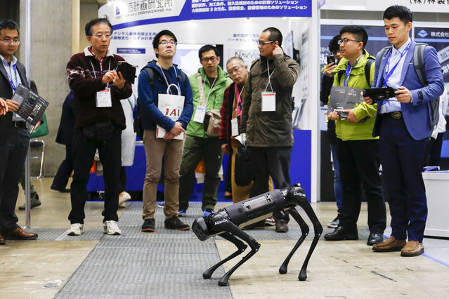 A robot dog AlienGo performs during the International Robot Exhibition 2019 (iREX2019) in Tokyo, Japan on December 21, 2019. The IREX is the largest robot trade fair in the world and shows new robots and high technology equipment from 637 companies and organisations. (Photo by Rodrigo Reyes Marin/Zuma Press/Rex Fetures/Shutterstock)