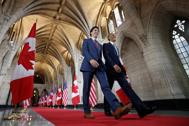 Canada's Prime Minister Justin Trudeau and U.S. President Barack Obama walk in the Hall of Honour on Parliament Hill in Ottawa, Ontario, Canada, June 29, 2016. (Photo by Chris Wattie/Reuters)