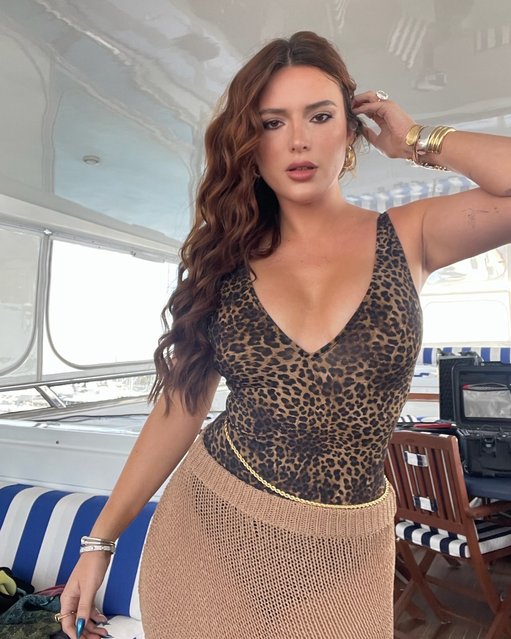 American actress and singer Bella Thorne in the second decade of October 2024 celebrates the last day of Hispanic Heritage Month in a leopard swimsuit. (Photo by bellathorne/Instagram)