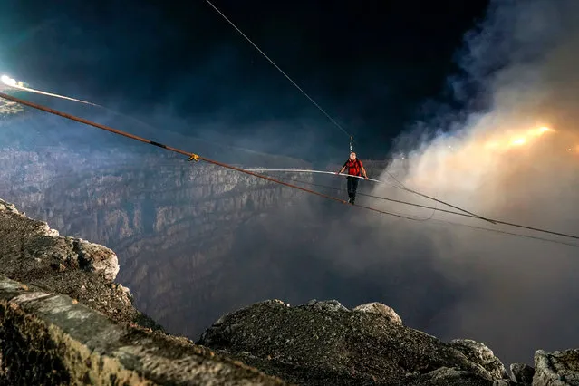 Handout picture released on March 5, 2020 by American Broadcasting Companies (ABC) showing US acrobat Nik Wallenda as he crosses the 1,800 foot high wire walk over the Masaya Volcano in Nicaragua, on March 4, 2020. Wallenda became the first person to complete the full crossing. (Photo by Oscar Duarte and Jeff Daly/American Broadcasting Companies/AFP Photo)