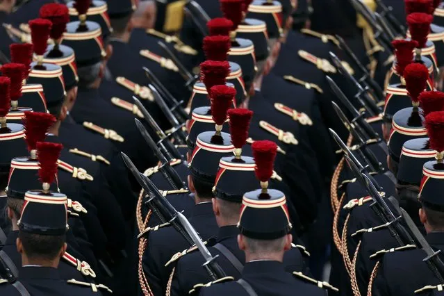 French Republicain Guards (Garde Republicaine) attend the Bastille Day military parade on the Champs-Elysees in Paris, France, July 14, 2016. (Photo by Benoit Tessier/Reuters)
