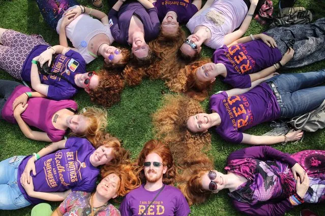 People with red hair from all over the world gather on “Roodharigendag” (Redhead Day) in Breda, The Netherlands, 07 September 2014. The Redhead Day is celebrated annually at the old Dutch city on the first weekend in September. It offers cultural events, music, a picnic, a fashion show and art exhibitions from and for the red haired community. (Photo by Arie Kievit/EPA)