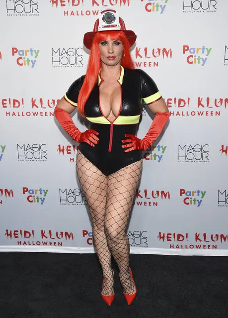 Coco Austin attends Heidi Klum's 18th Annual Halloween Party at Moxy Times Square on Tuesday, October 31, 2017, in New York. (Photo by Evan Agostini/Invision/AP Photo)