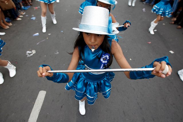 A sudent performs during a parade to commemorate the 194th anniversary of independence from Spain in downtown Tegucigalpa, Honduras, September 15, 2015. (Photo by Jorge Cabrera/Reuters)