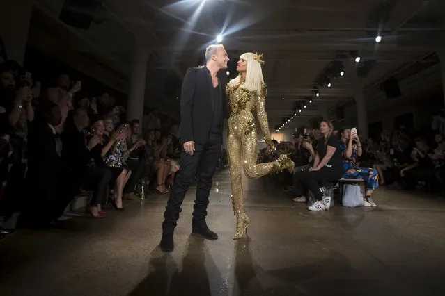 Designers Phillipe Blond (R) and David Blond pose at the end of the runway after The Blonds Spring/Summer 2016 collection during New York Fashion Week in New York September 16, 2015. (Photo by Carlo Allegri/Reuters)