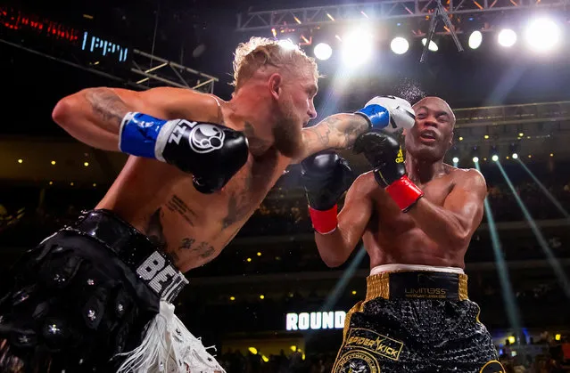 Jake Paul (left) lands a punch to the face of Anderson Silva during a boxing match at Desert Diamond Arena in Glendale, Arizona on October 29, 2022. (Photo by Mark J. Rebilas/USA TODAY Sports)