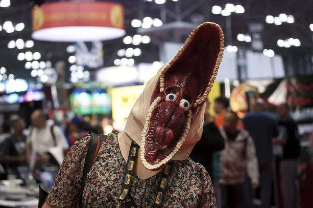 A costumed attendee dressed as the character Barbara Maitland, played by Geena Davis, from the Tim Burton's movie “Beetlejuice”. (Photo by Siemond Chan)