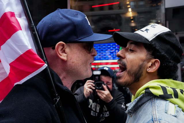 A Pro-Israeli supporter confronts a man attending a pro-Palestinian rally held to commemorate Land Day in New York City on March 30, 2025. (Photo by Adam Gray/Reuters)