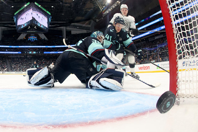 Samuel Helenius #79 of the Los Angeles Kings scores against Joey Daccord #35 of the Seattle Kraken during the third period at Climate Pledge Arena on April 15, 2025 in Seattle, Washington. (Photo by Steph Chambers/Getty Images/AFP Photo)