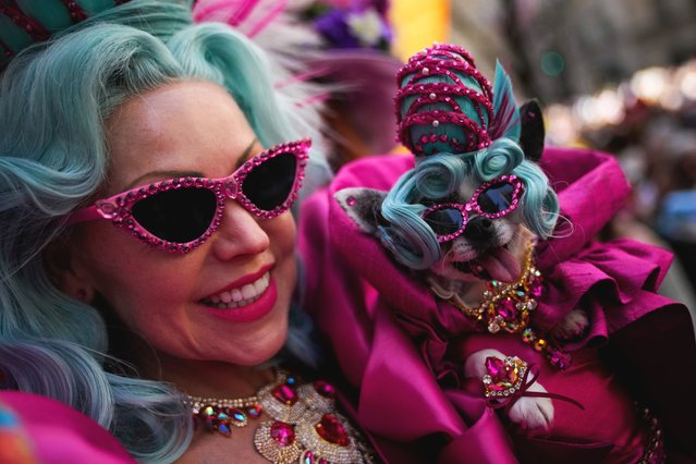 A woman and her dog take part in the annual Easter Parade and Bonnet Festival on 5th Avenue outside St. Patrick's Cathedral in Manhattan in New York City, U.S., April 20, 2025. (Photo by Eduardo Muñoz/Reuters)