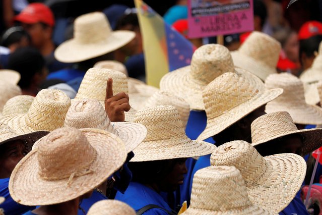 Supporters of Venezuela's President Nicolas Maduro participate in May Day celebrations in Caracas, Venezuela, on May 1, 2025. (Photo by Leonardo Fernandez Viloria/Reuters)