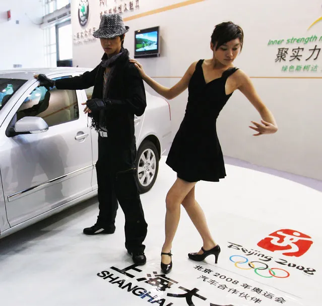 Chinese models promote a joint venture car at Auto Exhibit Trade Show of Beijing in Beijing, China. (Photo by Guang Niu)