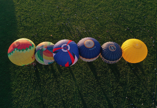 Hot-air balloons of participants in the 2020 Sky of Russia International Balloon Festival in Ryazan Region, Russia on August 17, 2020. (Photo by Alexander Ryumin/TASS)