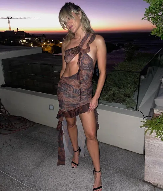 American singer Ashley Roberts, the Pussycat Doll star turned radio host, 41, slipped into see-through dress and black heels as she partied into 2023. (Photo by Instagram)