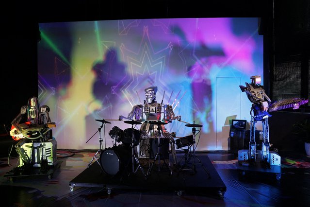 A robot band performs at a robot-themed restaurant at Robot Mall in Beijing, China on August 6, 2025. The store is among China's first to sell humanoid and consumer-oriented robots, reflecting the country's ambition to lead in AI and robotics. (Photo by Florence Lo/Reuters)