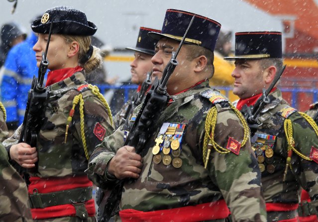 French troops march during a military parade celebrating Romania's National Day in Bucharest December 1, 2014. (Photo by Radu Sigheti/Reuters)