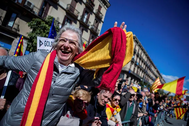 Thousands of people take part in the demonstration called by Societat Civil Catalana (SCC) under the motto “Now more than ever, common sense” to denounce the political blockage in Catalonia, in Barcelona, Spain, 18 March 2018. Protesters claim the region is in a complete political blockage as no Government has been invested three months after regional elections and no there is no candidate to the regional Presidency. Last 12 March 2018, the Speaker of Catalonia's regional Parliament, Roger Torrent, postponed the session that was going to be held to invest Jordi Sanchez as regional President, after the Supreme Court denied his freedom. Jordi Sanchez remains under provisional detention for his role in the Catalan independence process, while former regional President and initial candidate Carles Puigdemont remains in Belgium. (Photo by Enric Fontcuberta/EPA/EFE)