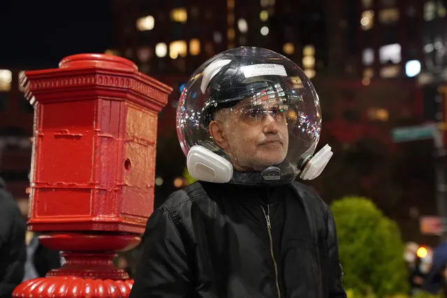 A person wearing a respirator helmet during the coronavirus pandemic or COVID-19 pandemic near Union Square in New York, NY on November 5, 2020. (Photo by Christopher Sadowski/The New York Post)