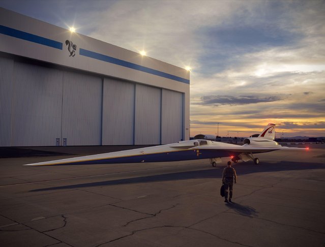 This NASA image released April 3, 2018 shows an artist’s concept of the low- boom flight demonstrator outside the Lockheed Martin Aeronautics Company’s Skunk Works hangar in Palmdale, California. NASA has inked a deal with Lockheed Martin to develop a supersonic “X- plane” that could break the sound barrier without a sonic boom, officials said April 3, 2018. (Photo by AFP Photo/NASA)