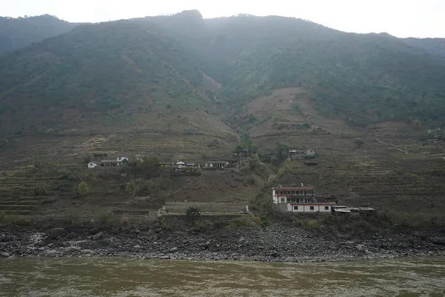 A view of Lazimi village seen from across the river in Nujiang Lisu Autonomous Prefecture in Yunnan province, China, March 24, 2018. (Photo by Aly Song/Reuters)