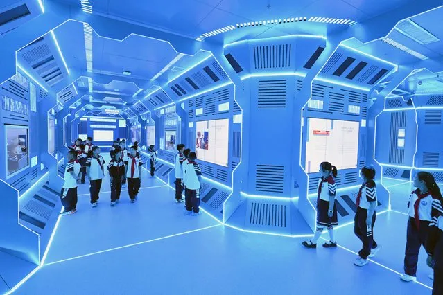 Students visit an educational base of AI in Handan, in China's northern Hebei province on May 25, 2023. (Photo by AFP Photo/China Stringer Network)